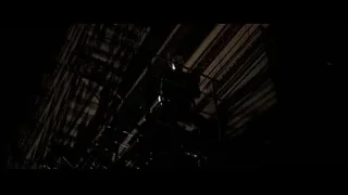 person on scaffolding on tall building — Batman: The Dark Knight