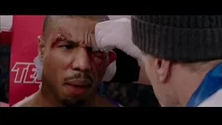 man with bruised eye in boxing ring — Creed