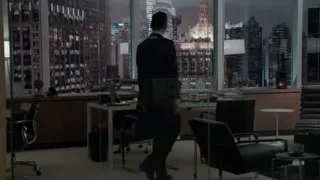 man speaking to woman in office — Suits