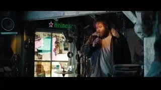 man singing into microphone in dimly lit room — The Secret Life of Walter Mitty