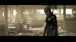 person in futuristic suit in destroyed room — Superman: Man of Steel