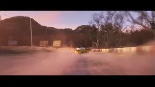 Yellow car STORM driving on dirt road at sunset — Cars 3