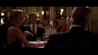 Three people conversing in restaurant — Batman: The Dark Knight