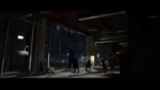People and dog in industrial room — Batman: The Dark Knight