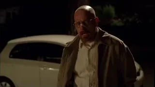 elderly man standing by white car at night — Breaking Bad
