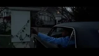 old black car parked at mansion — Creed