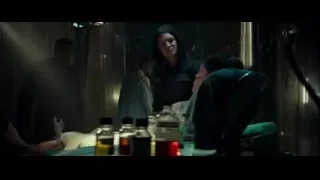 person in eerie dimly lit room — Deadpool
