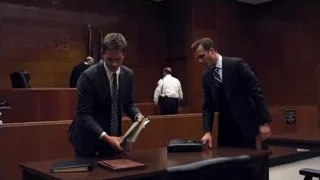 Two men in suits walking in courtroom — Suits