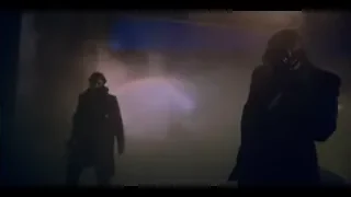 men in gas masks with gun in dark room — Peaky Blinders