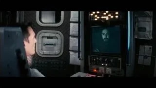 man sitting in spaceship control room — Interstellar