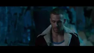 man in red jacket in dimly lit room — Deadpool