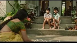 mother and two boys on house steps — Life of Pi