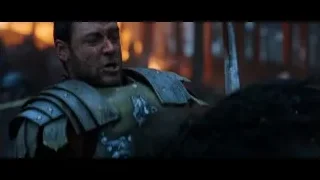 man in armor holding knife — Gladiator