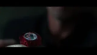 Hand holding small object — Iron Man 3
