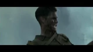man in military uniform with bloody face — Hacksaw Ridge