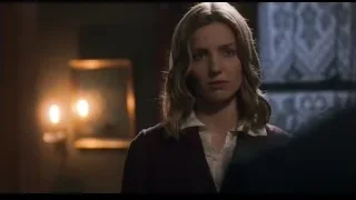 Young woman standing in dimly lit room with candles — Peaky Blinders