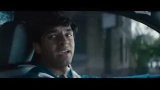 young man sitting in car smiling — Deadpool 2