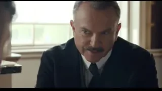 man in suit sitting by window — Peaky Blinders