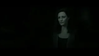 woman standing in dark room — Harry Potter and the Deathly Hallows 2
