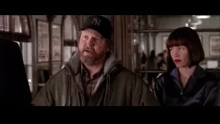 Man and woman in deep thought at restaurant — Spider Man 2