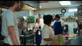 group of people in kitchen — The Bear