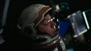 Man in helmet with closed eyes in space station — Interstellar