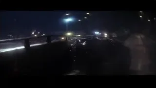 Truck driving on wet foggy road at night — Batman