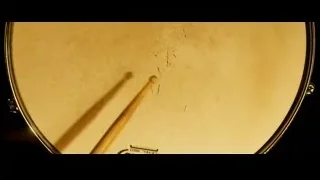 drum with drumsticks resting on it — Whiplash