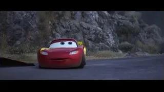 Red car on road with rocky cliff — Cars 3
