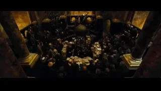 People gathered around altar in grand church — Harry Potter and the Goblet of Fire
