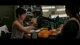 Woman sitting at desk in office — The Dictator