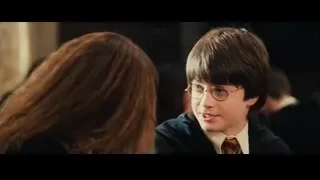 boy in suit talking to woman — Harry Potter and the Philosophers Stone