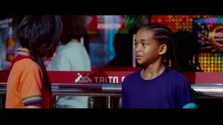 young girls in front of Triton sign — The Karate Kid