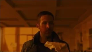 man with bloody face in dark room — Blade Runner 2049