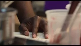 person's hand writing on paper — The Bear