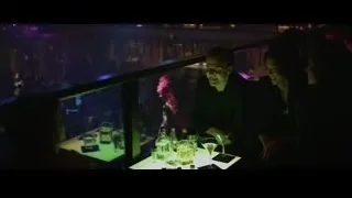 people at dimly lit nightclub — The Social Network