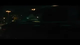 People walking on street at night — John Wick: Chapter 4