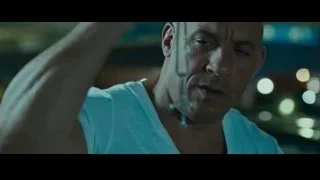 man holding chain in dark room — Furious Seven
