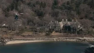two helicopters flying over mansion — Succession