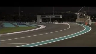 Formula One cars on track at night — F1