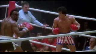 Two boxers fighting in a ring — Rocky III