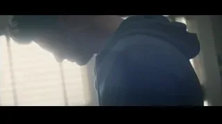 young man in dark room thinking — The Amazing Spider Man 2