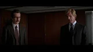 two men standing in dimly lit room — Batman: The Dark Knight