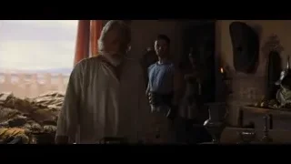 elderly man in white robe city view — Gladiator