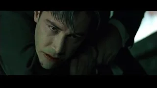 man's face with intense expression — The Matrix