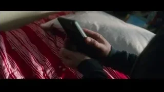 Hands holding gold ring on striped blanket — The Amazing Spider Man 2