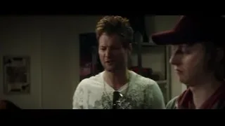 man holding gun talking to another man — Deadpool