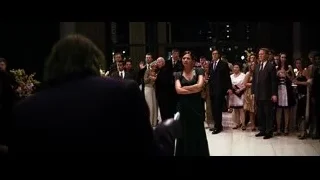 woman in green dress at formal event — Batman: The Dark Knight