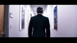 man walking down long hallway — Jobs