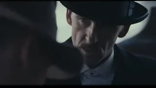 man in suit and top hat close-up — Peaky Blinders